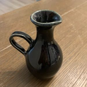 Small Black Handled Vase 2 3/4” Tall Has some White